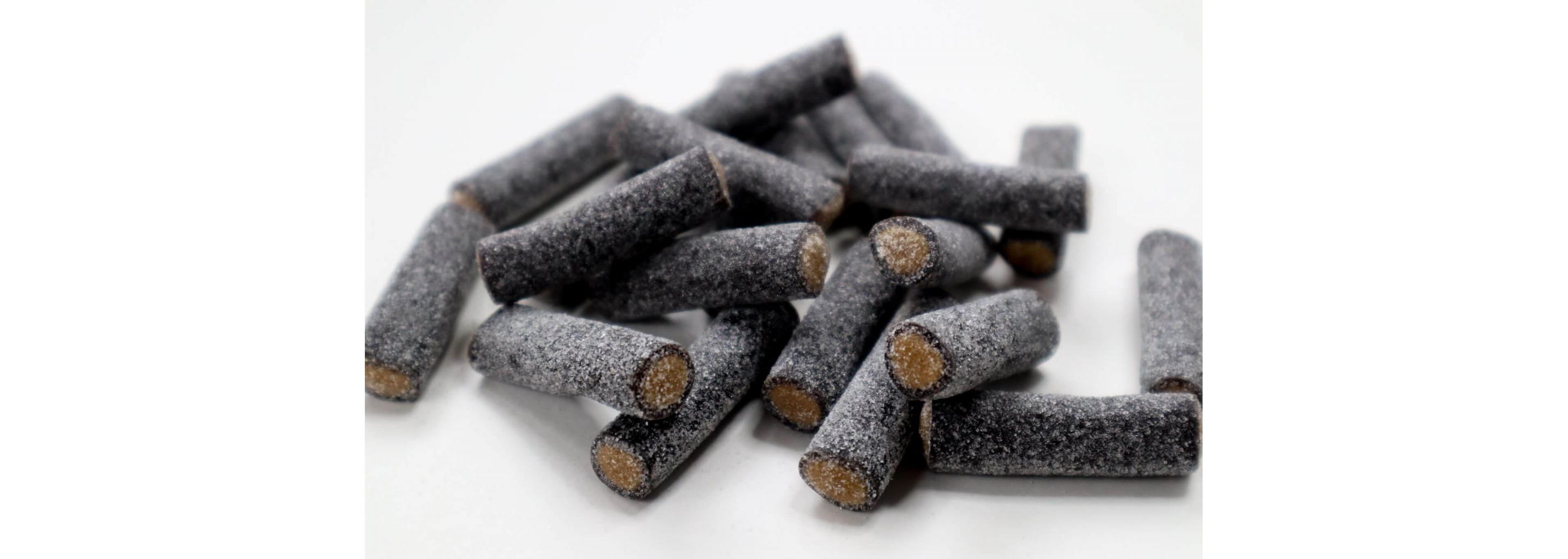 A pile of sugared salmiakki.