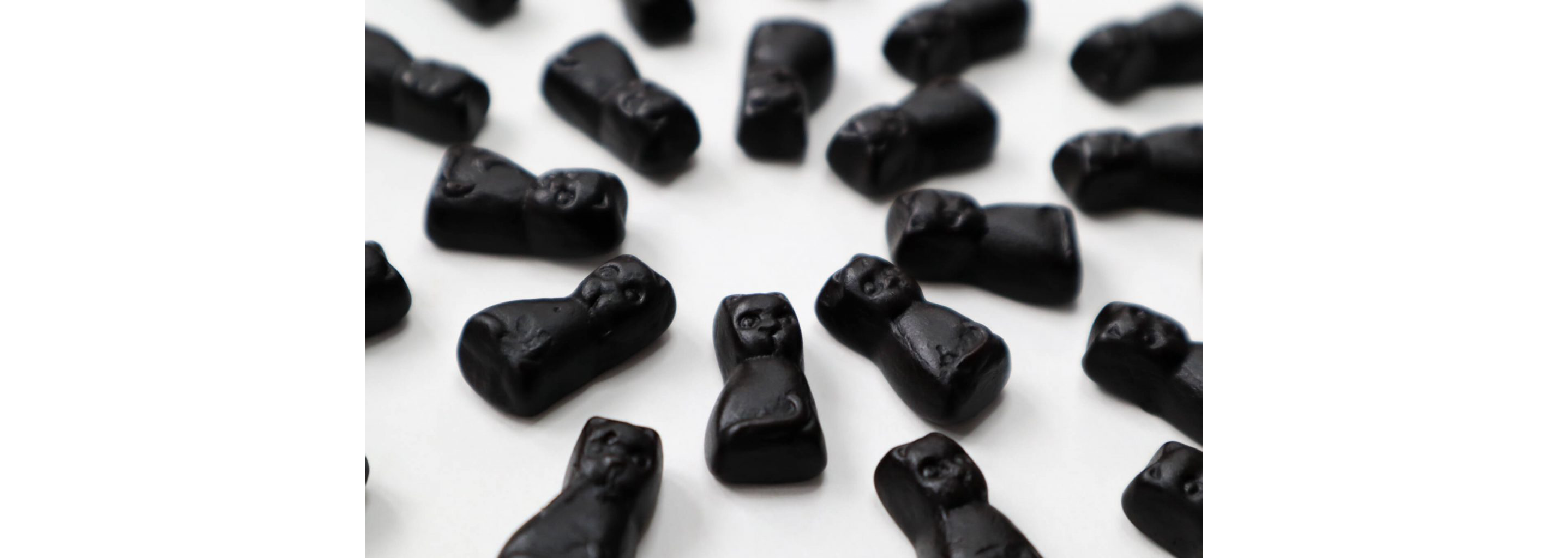 Salmiakki gummy candies shaped as cats.