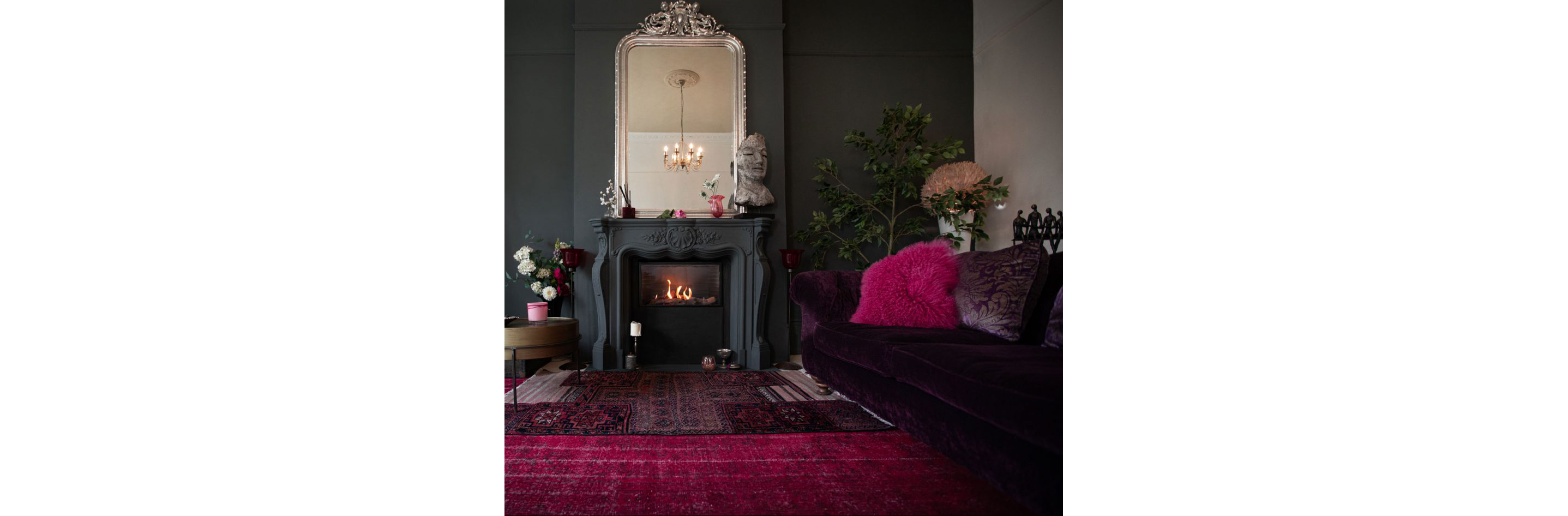 A dark living room with beetroot colors.