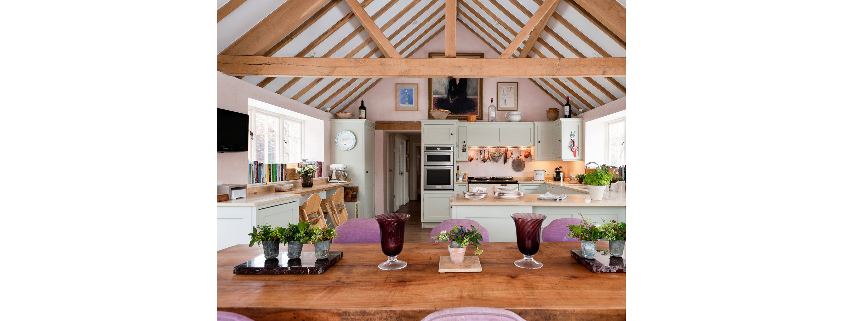 A bright kitchen with soft beetroot shades.