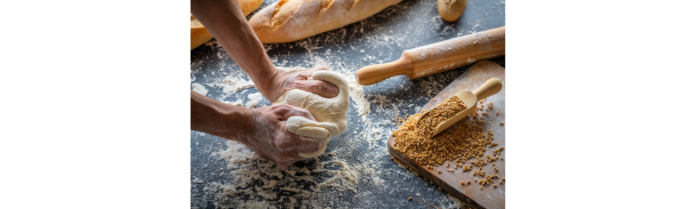 Hands making dough.