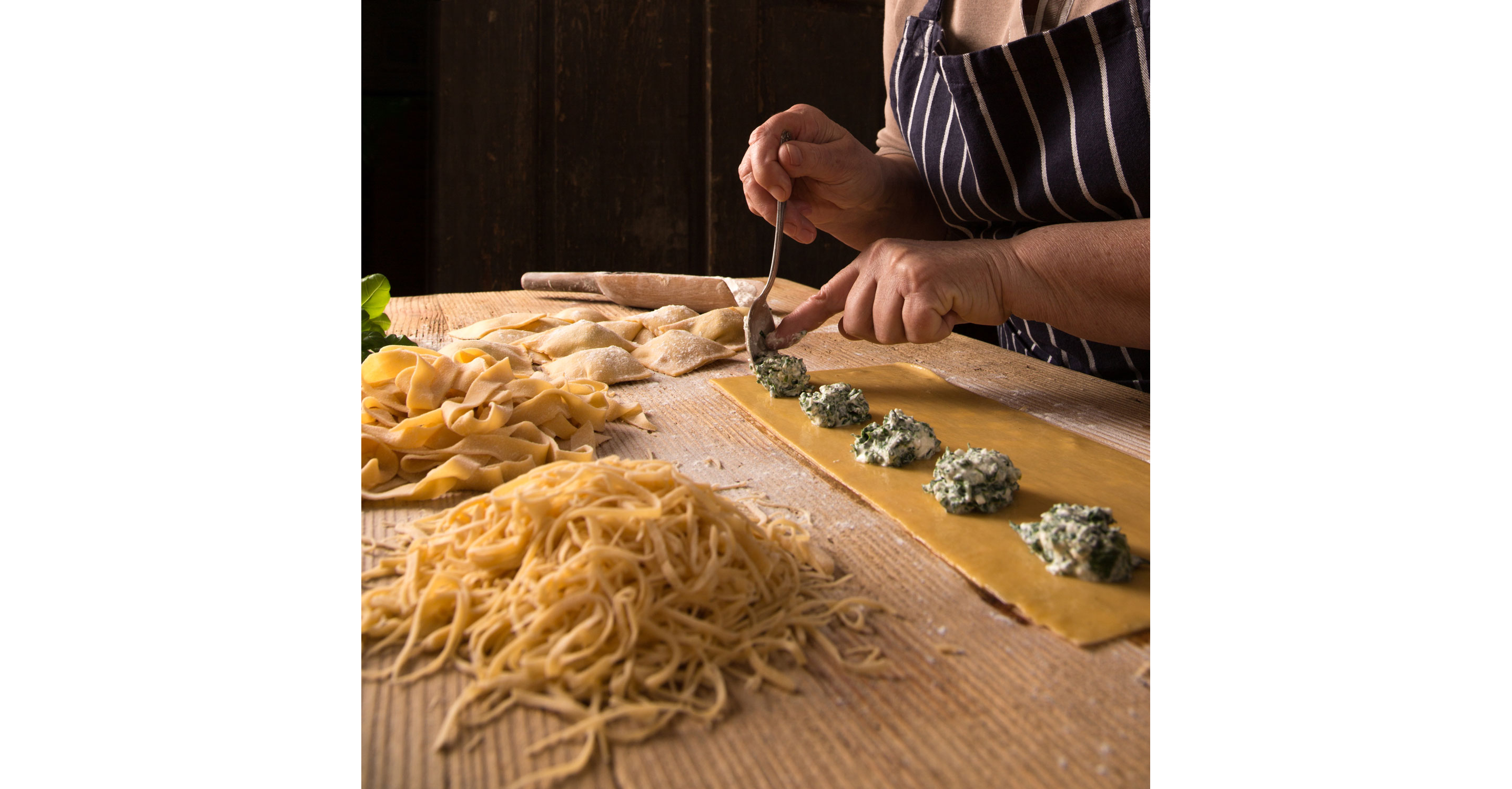 A person making pasta.