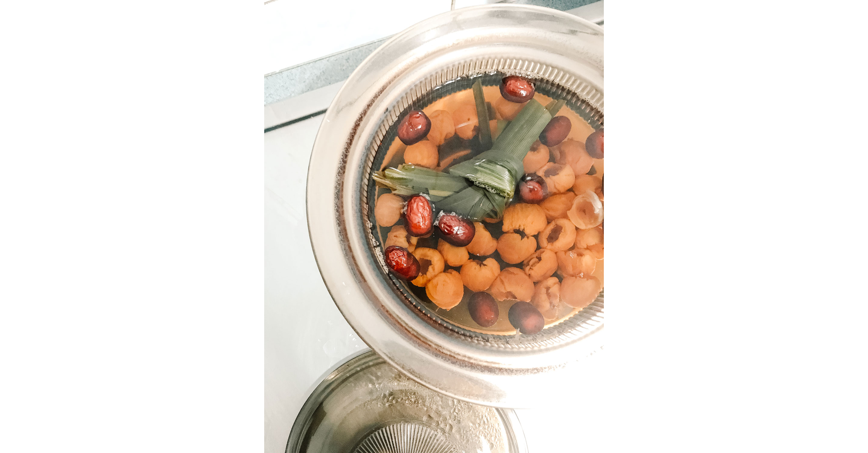 A large, filled pot resting on a stove.