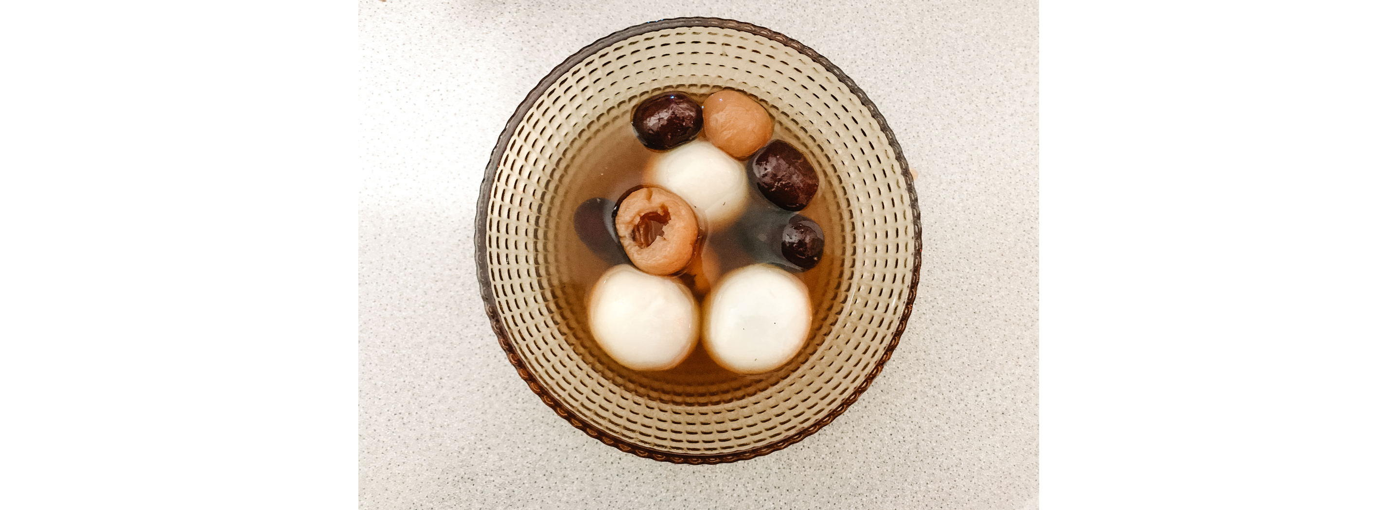 A large, filled pot resting on a stove.