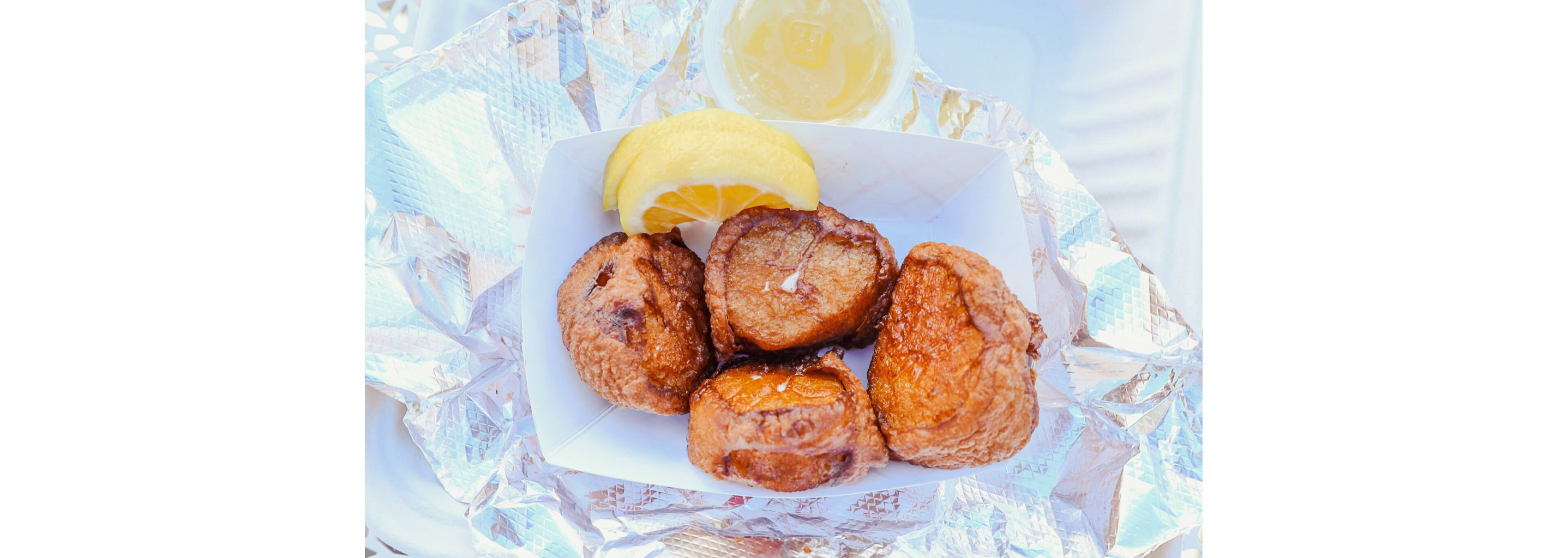 A basket of fried scallops.