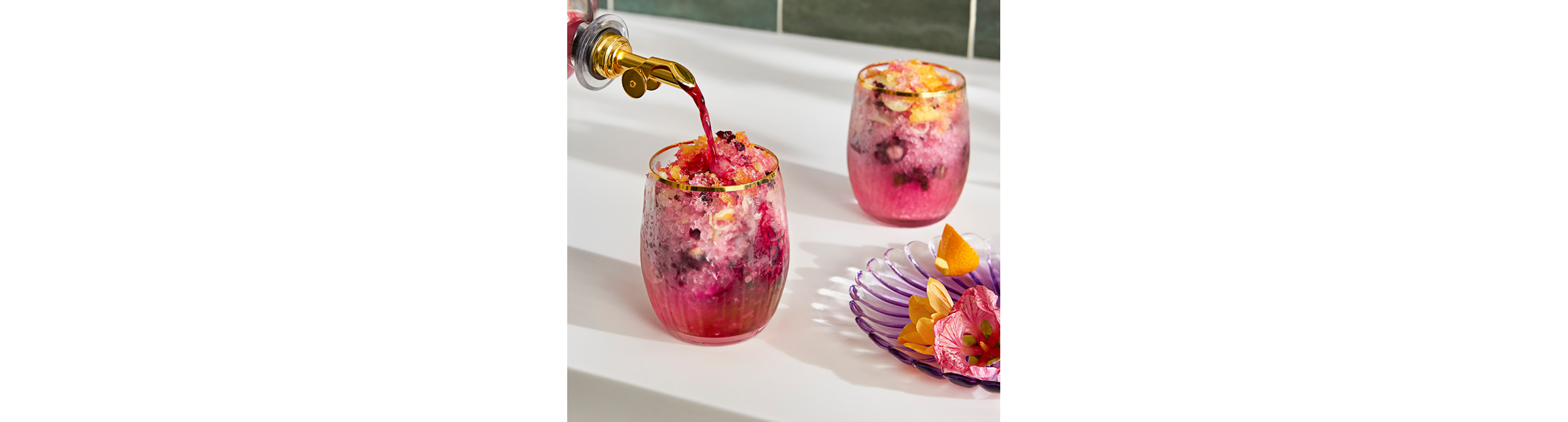 A set of three Hibiscus cocktails.