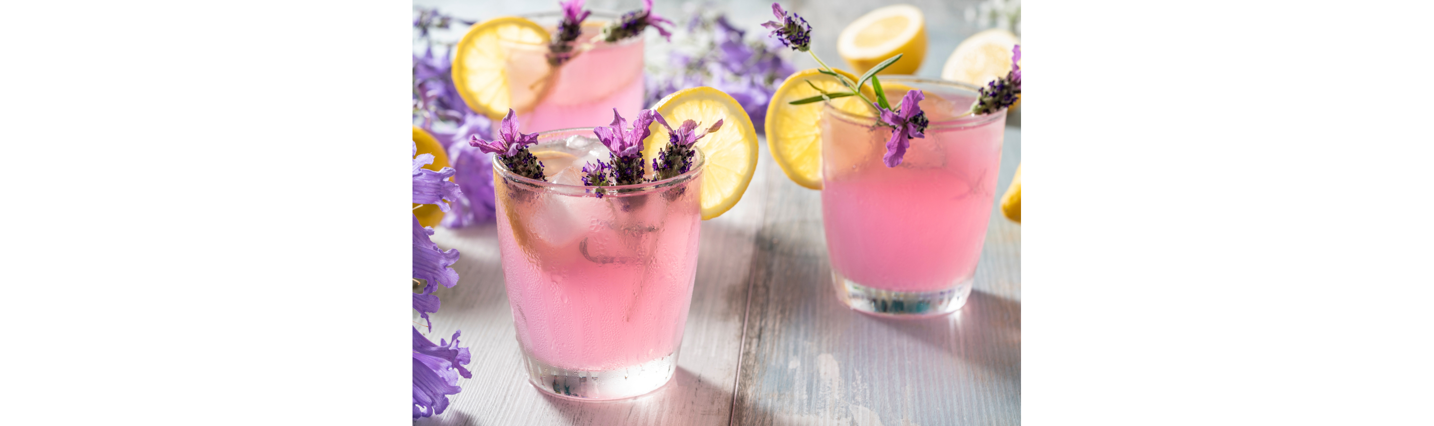 A set of three lavender lemon cocktails.