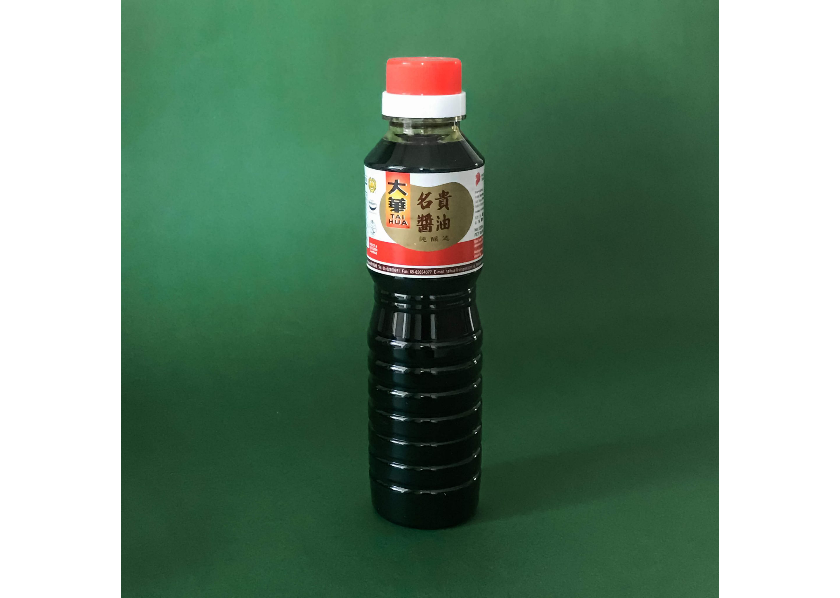 A tall bottle of Tai Hua Superior Dark Soy Sauce.