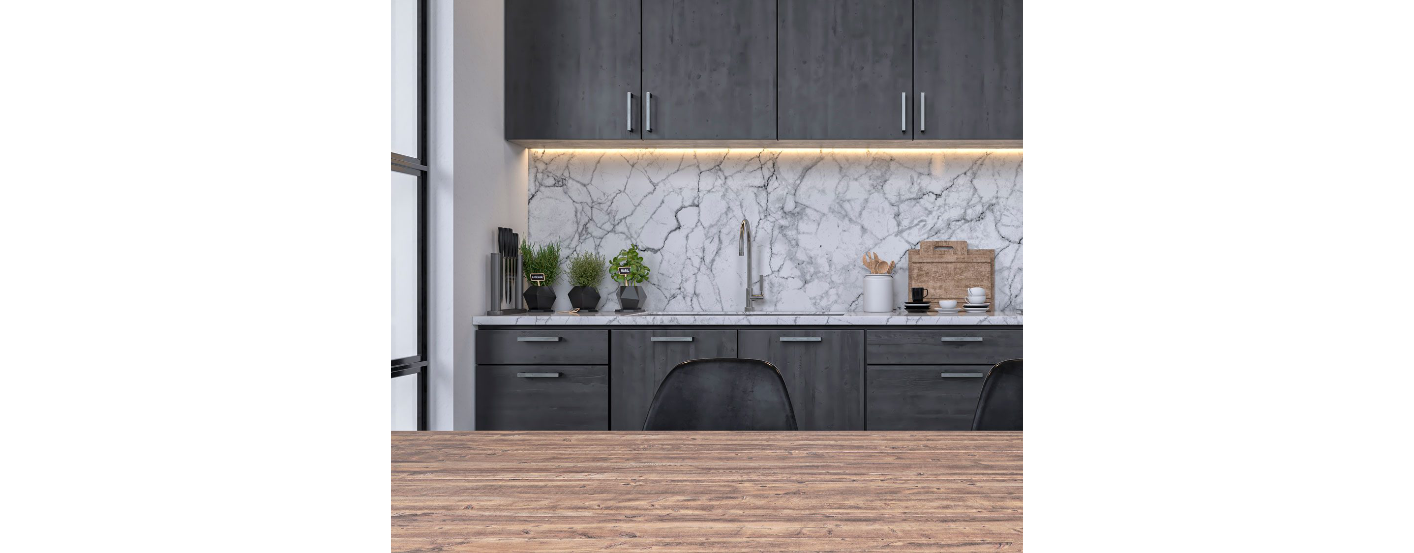 A modern kitchen with gray tones.
