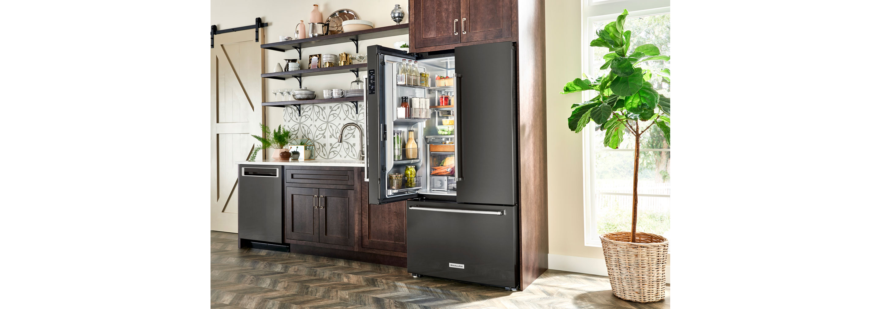 A KitchenAid® refrigerator with French doors.