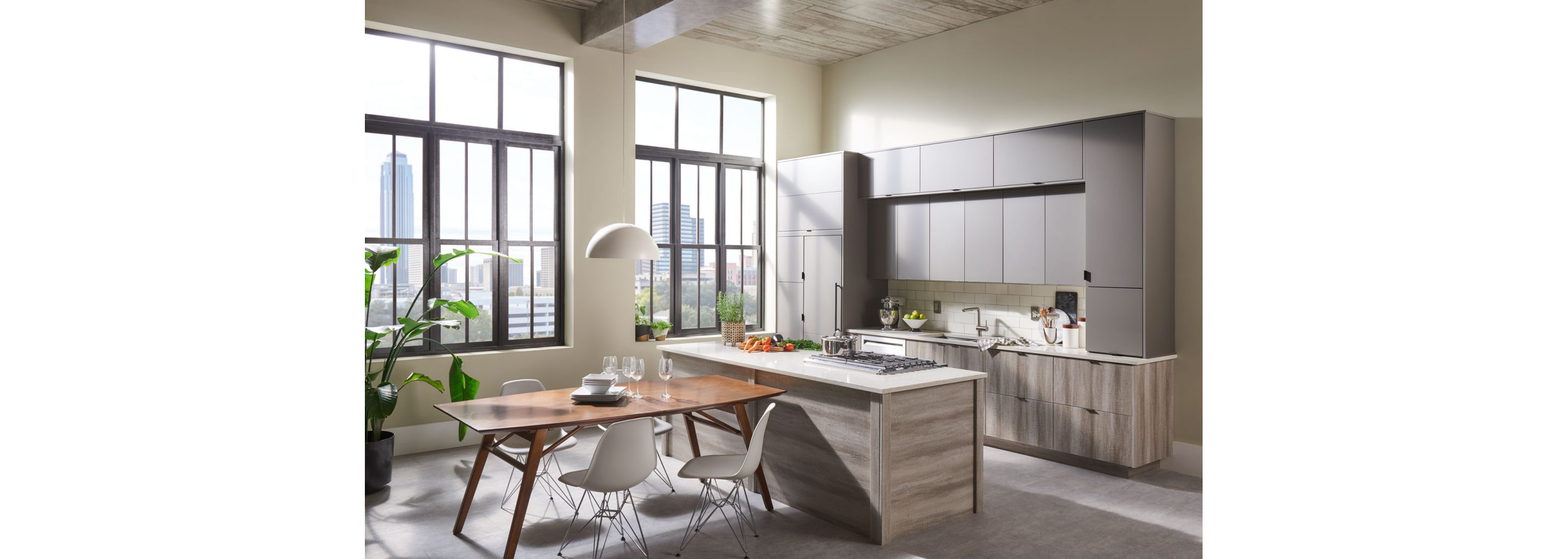 A streamlined kitchen and dining space.