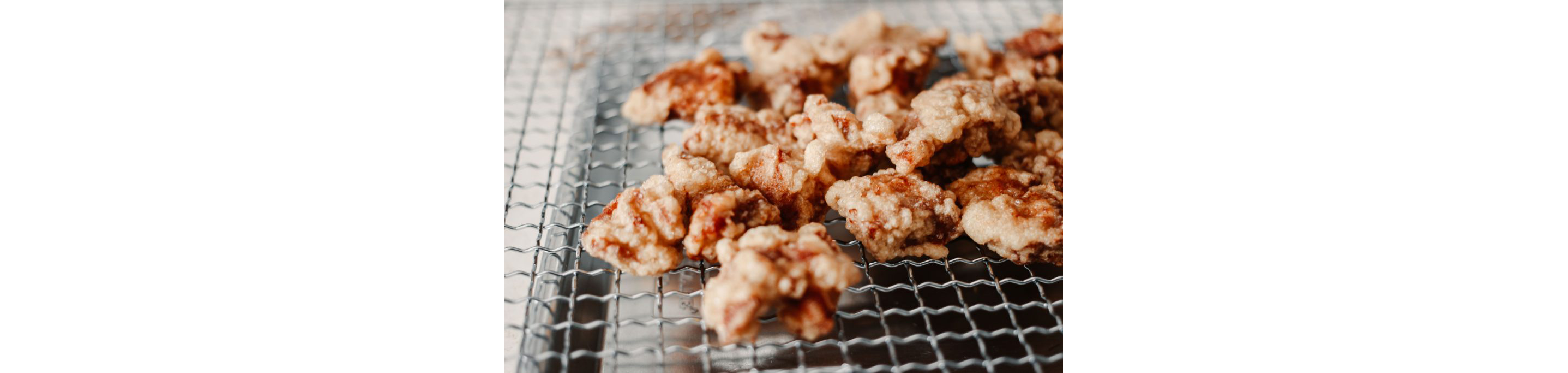 Small pieces of fried pork out to cool.