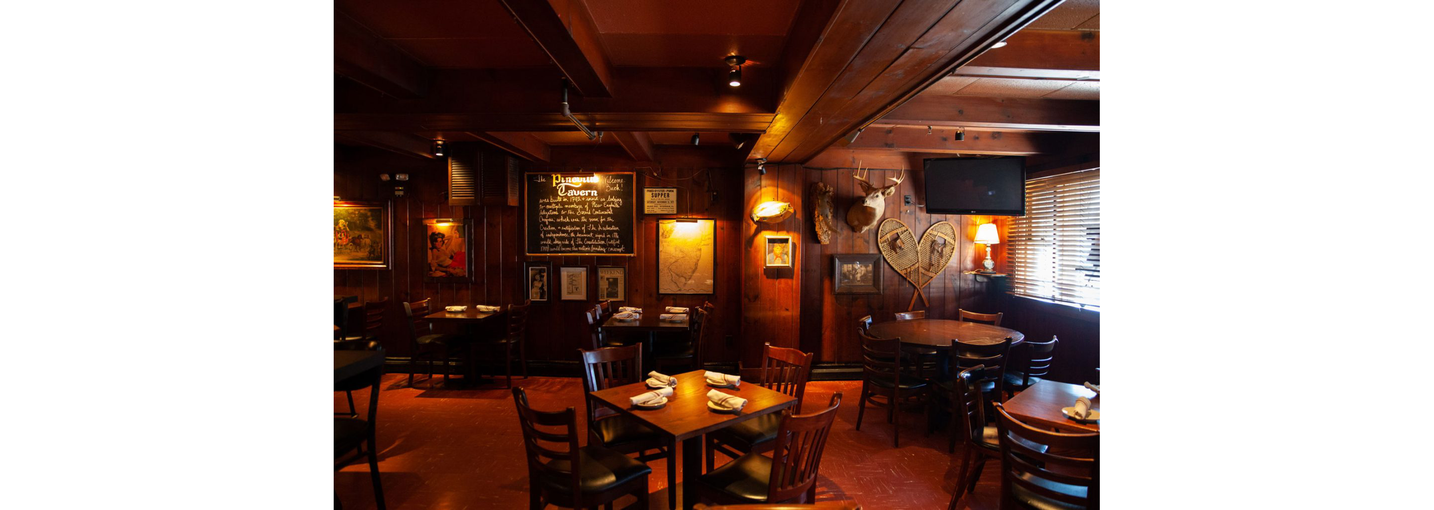 The clean, refined interior of the Pineville Tavern.