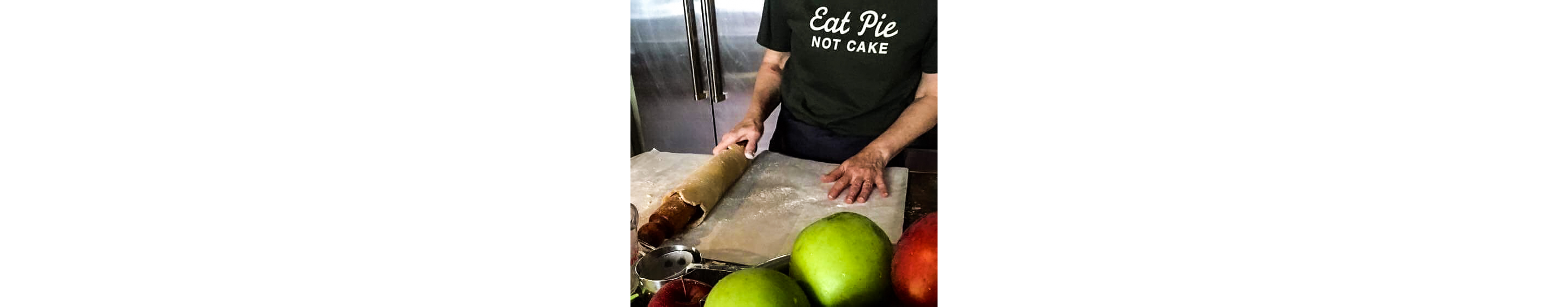 Rolling out pie crust.