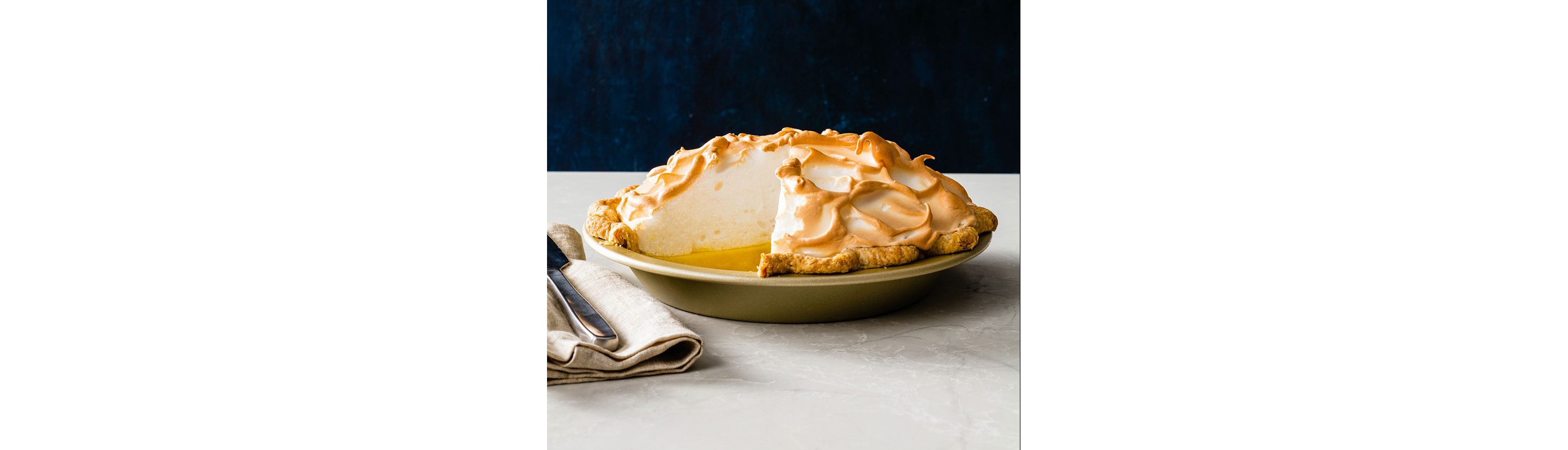 A pie with a single slice cut out.