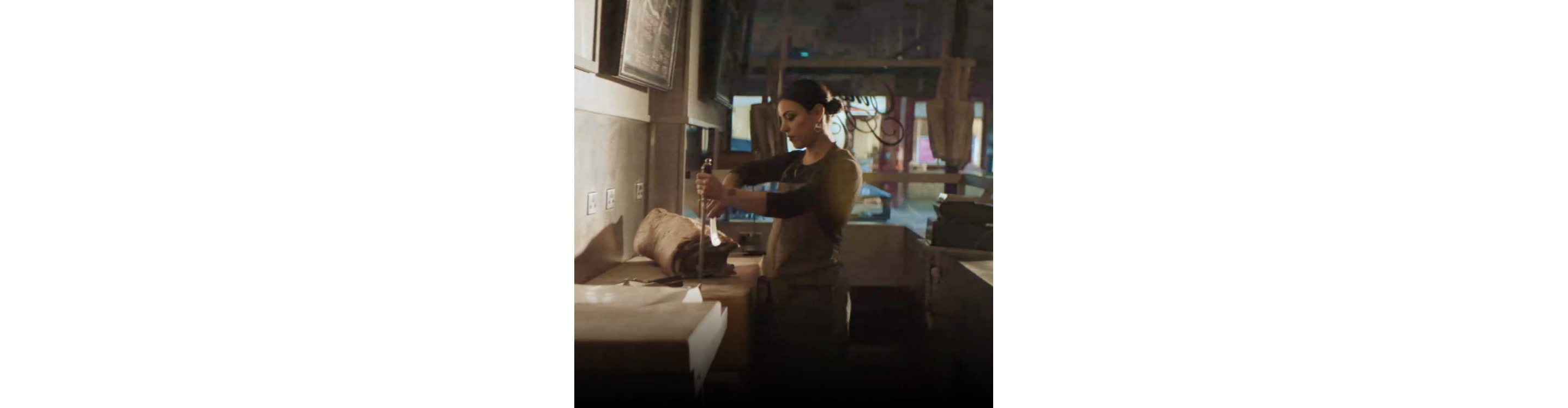 Etana Diaz sharpening her butcher’s knife.