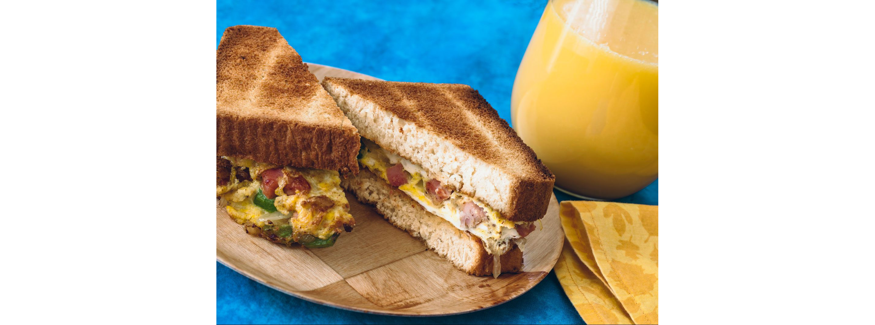A Denver sandwich cut cleanly in half.
