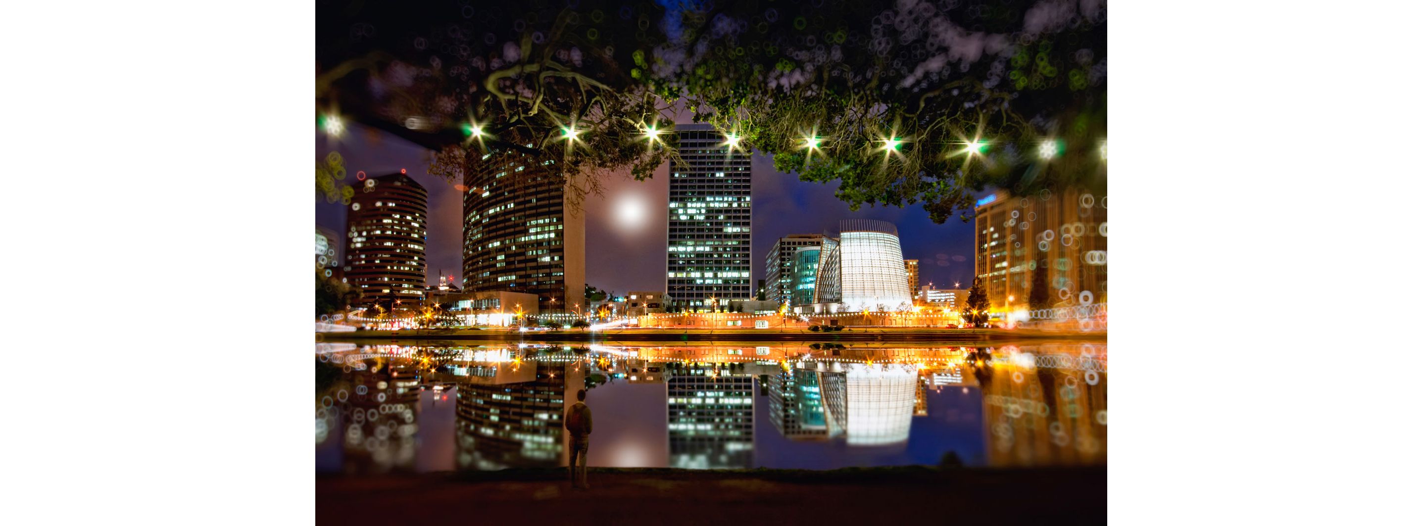 The nighttime cityscape of of Oakland, California.