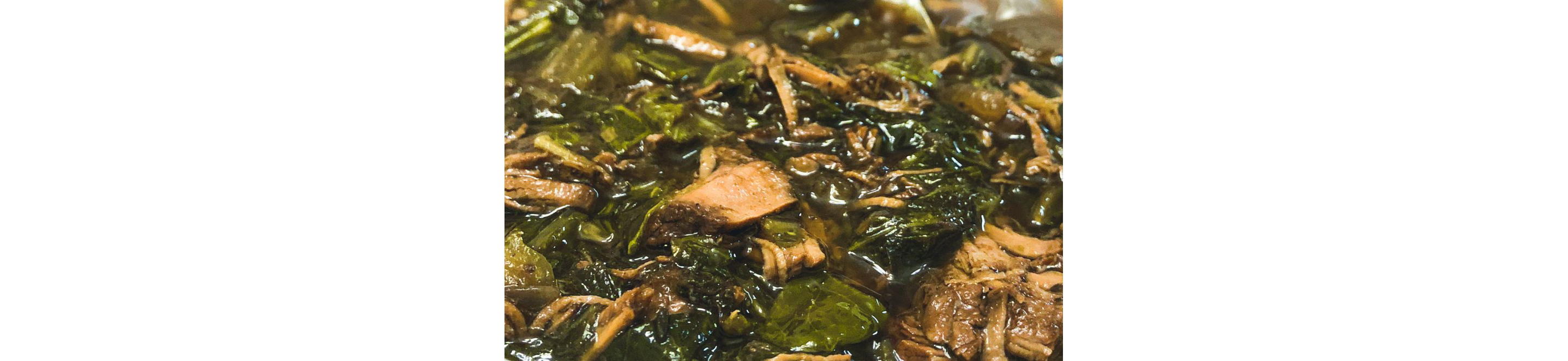 A close-up view of pepperpot stew.