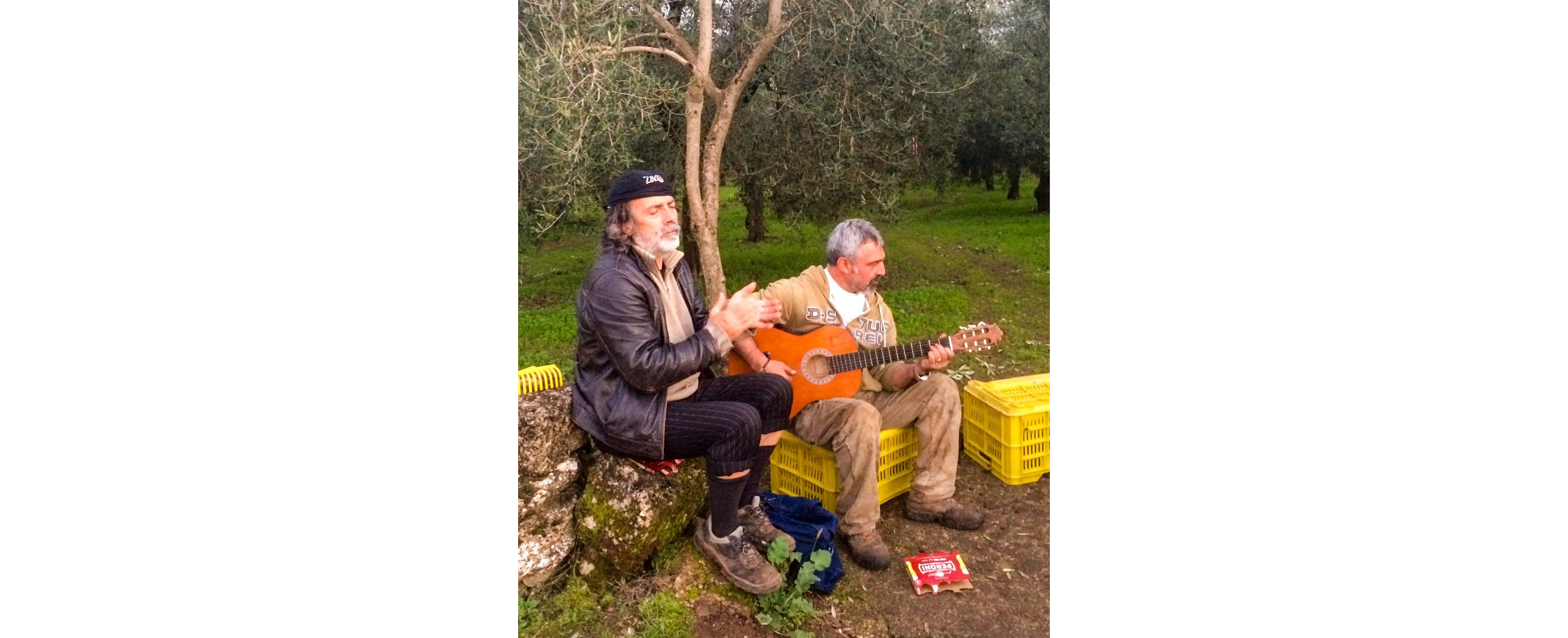 Two people playing music.