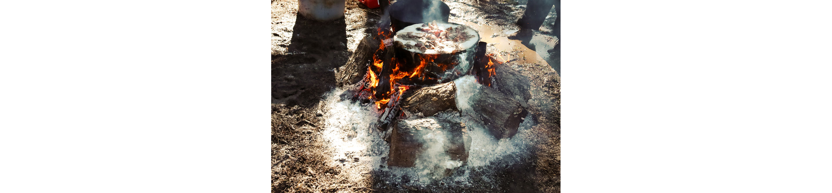 Lowcountry boil of tantalizing mix of shrimp, crab, potatoes, and sausage also known as Frogmore Stew on an open fire.