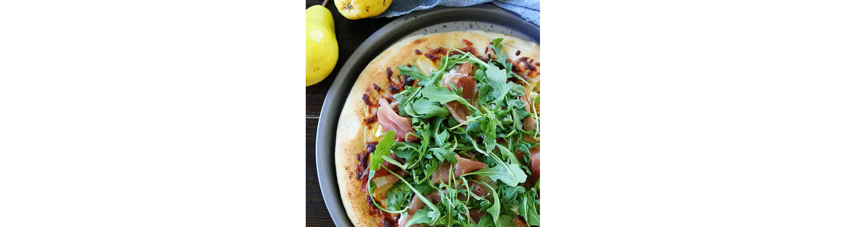 Arugula, pear and prosciutto flatbread