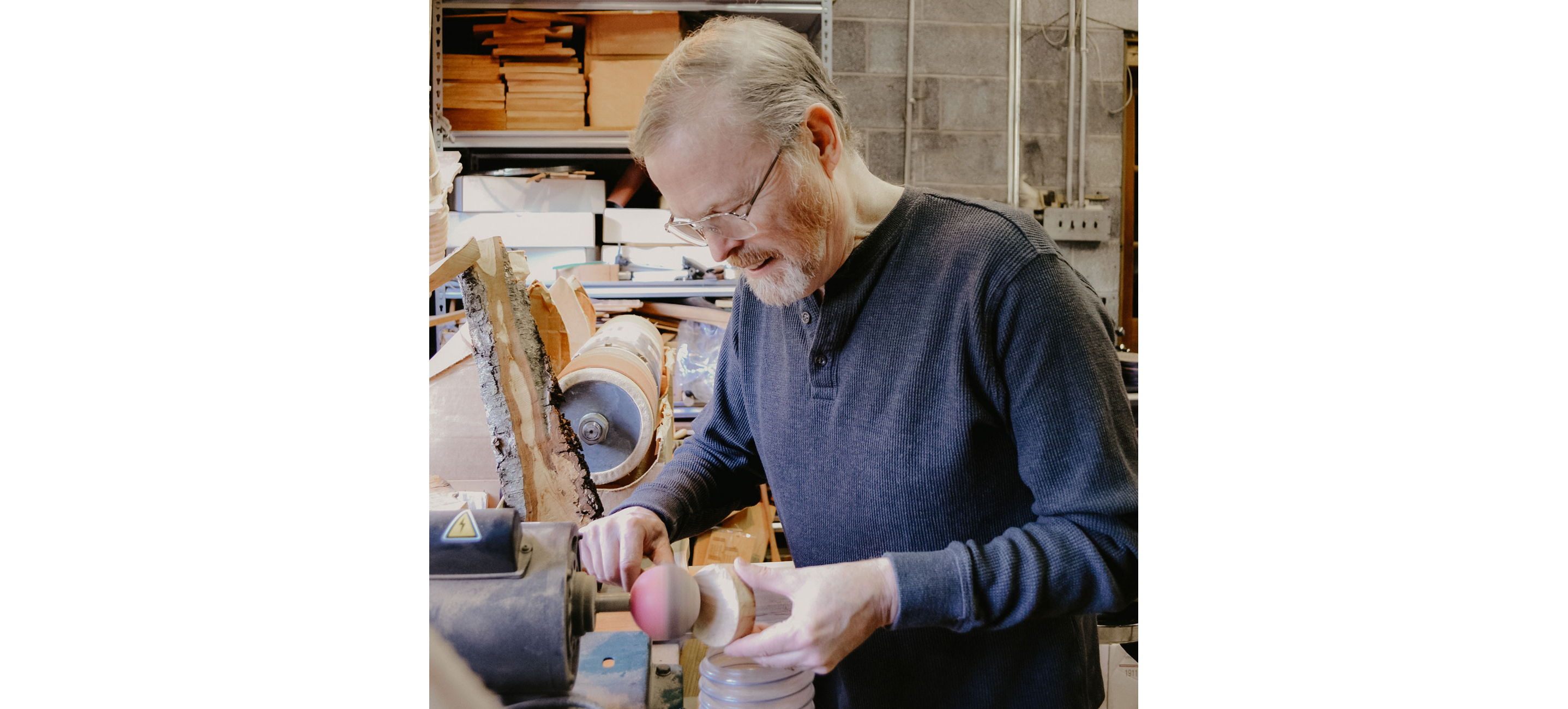 Jonathan Simons working with his tools.