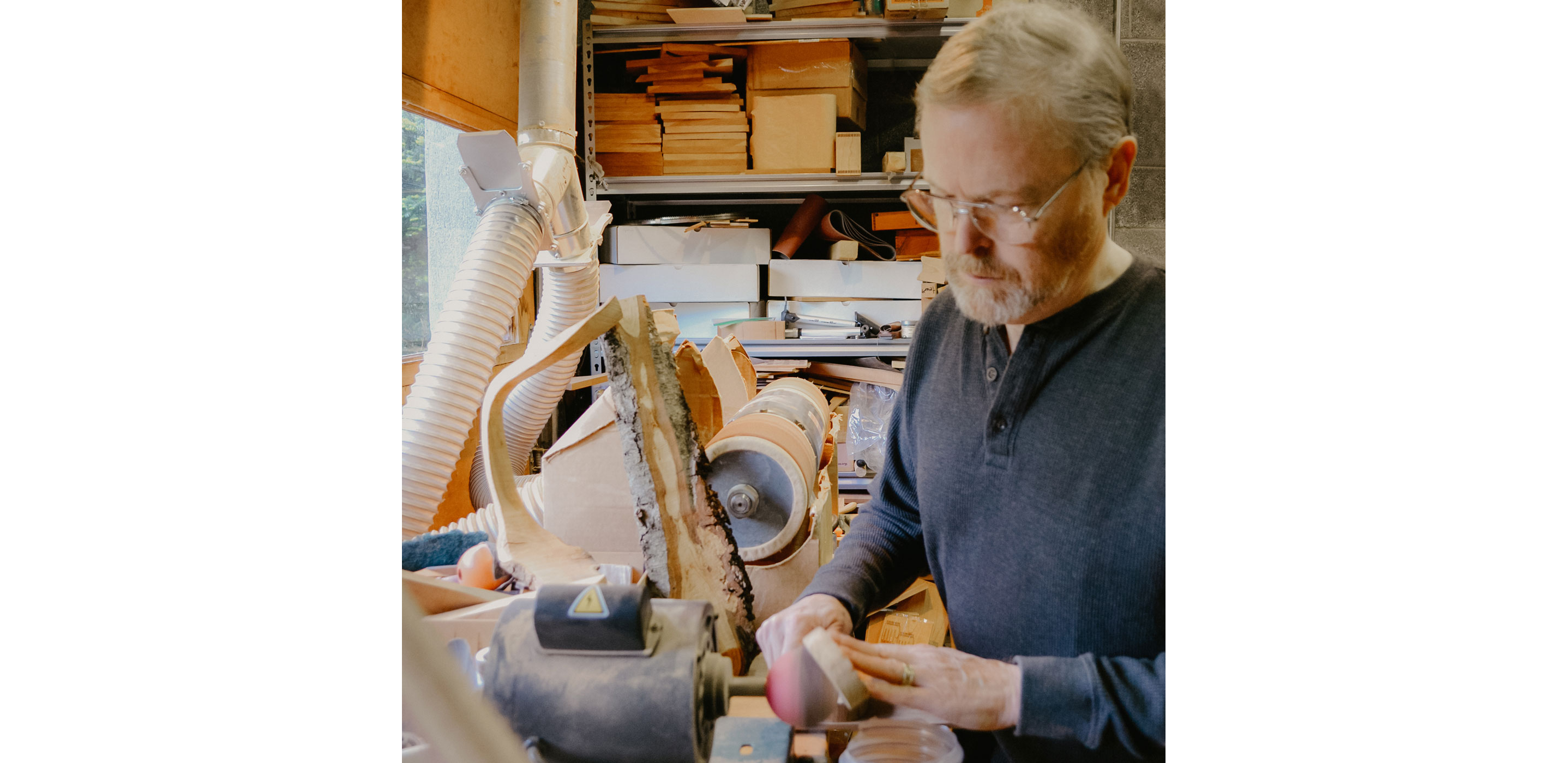 Jonathan Simons working with his tools.