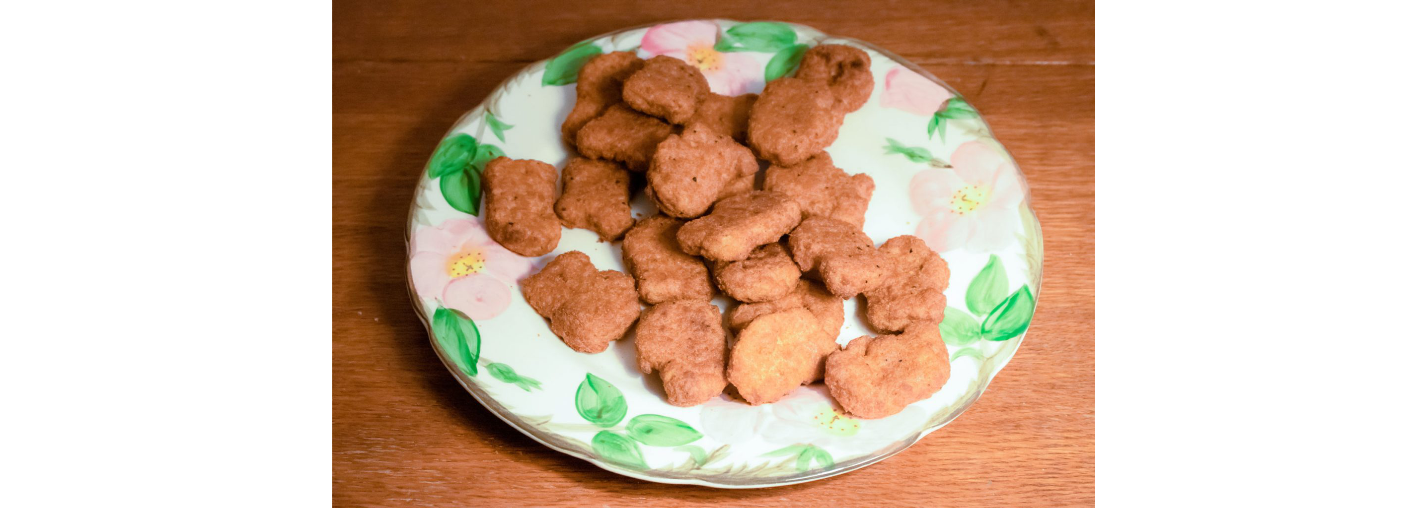 A delicate plate filled with Nuggs' plant-based nuggets.