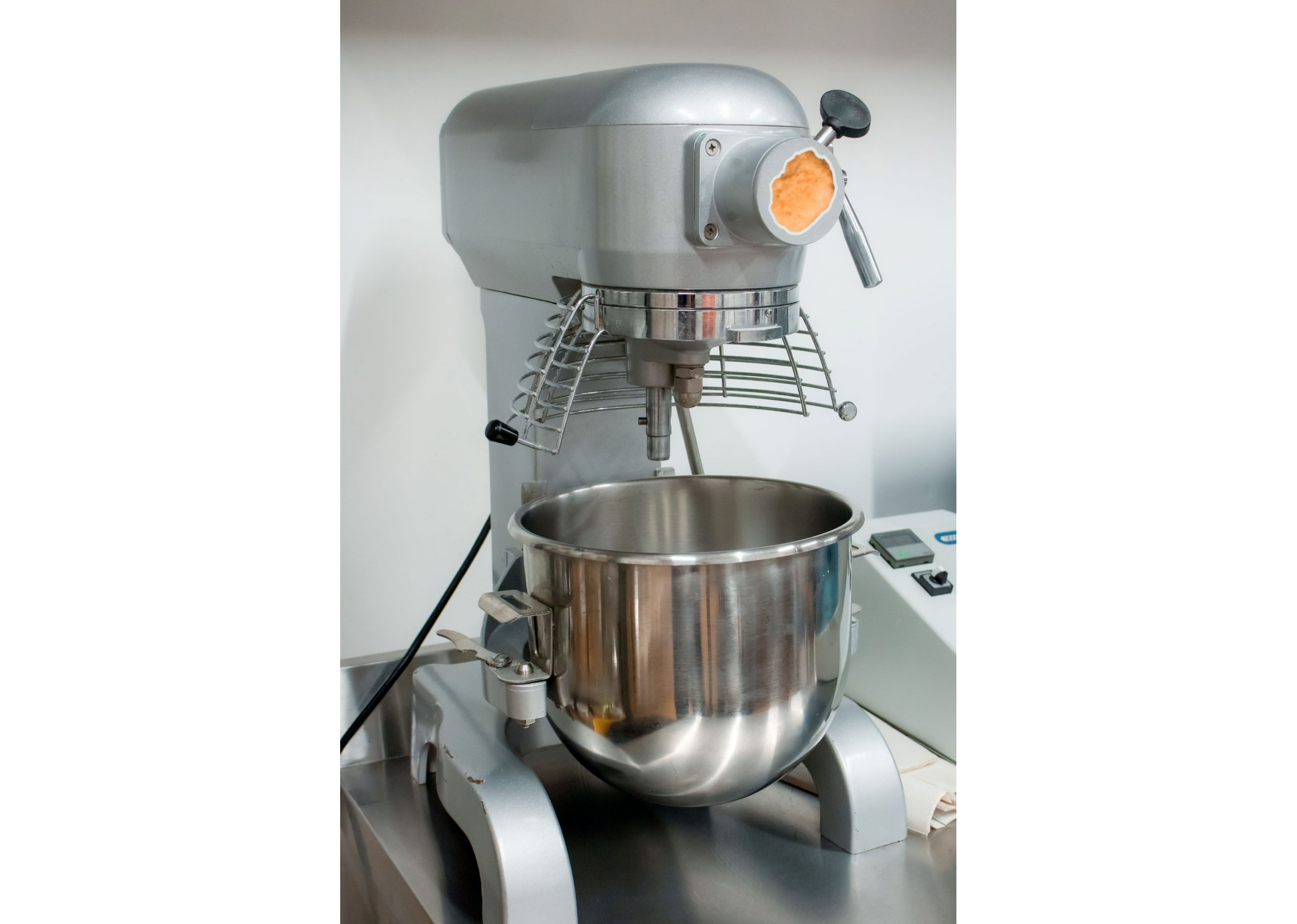 A large, powerful mixer used to blend the ingredients of the plant-based nuggets.
