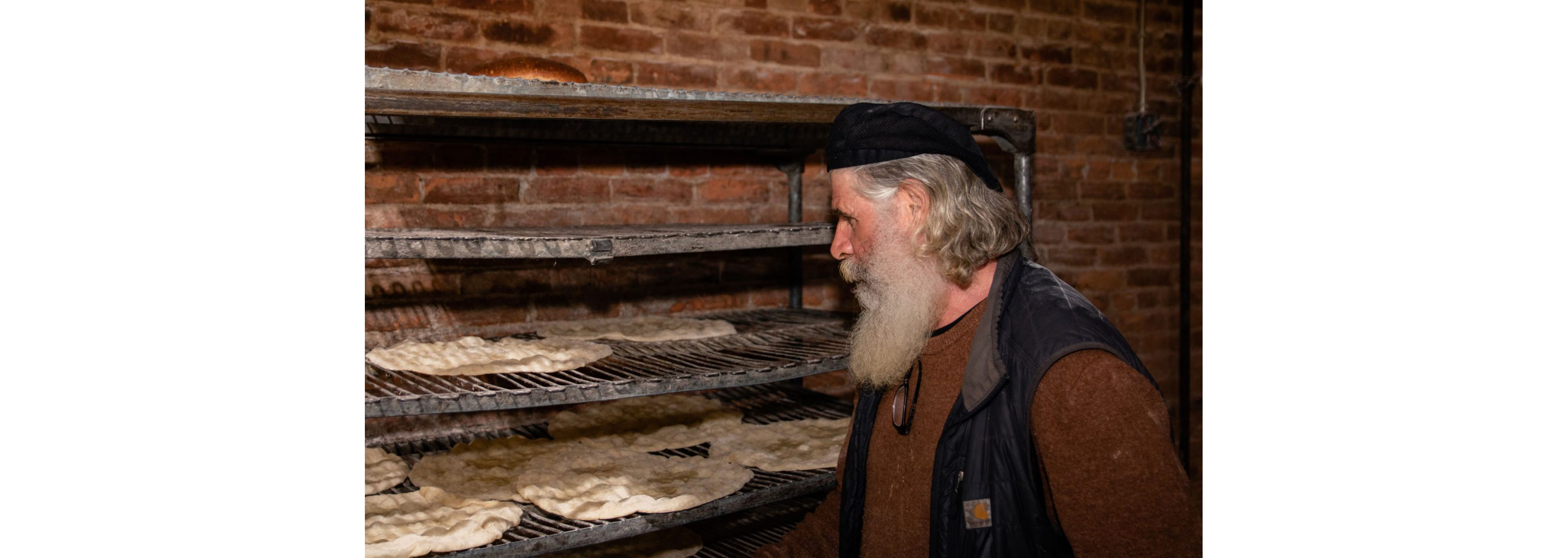 Richard Bourdon examining his work.