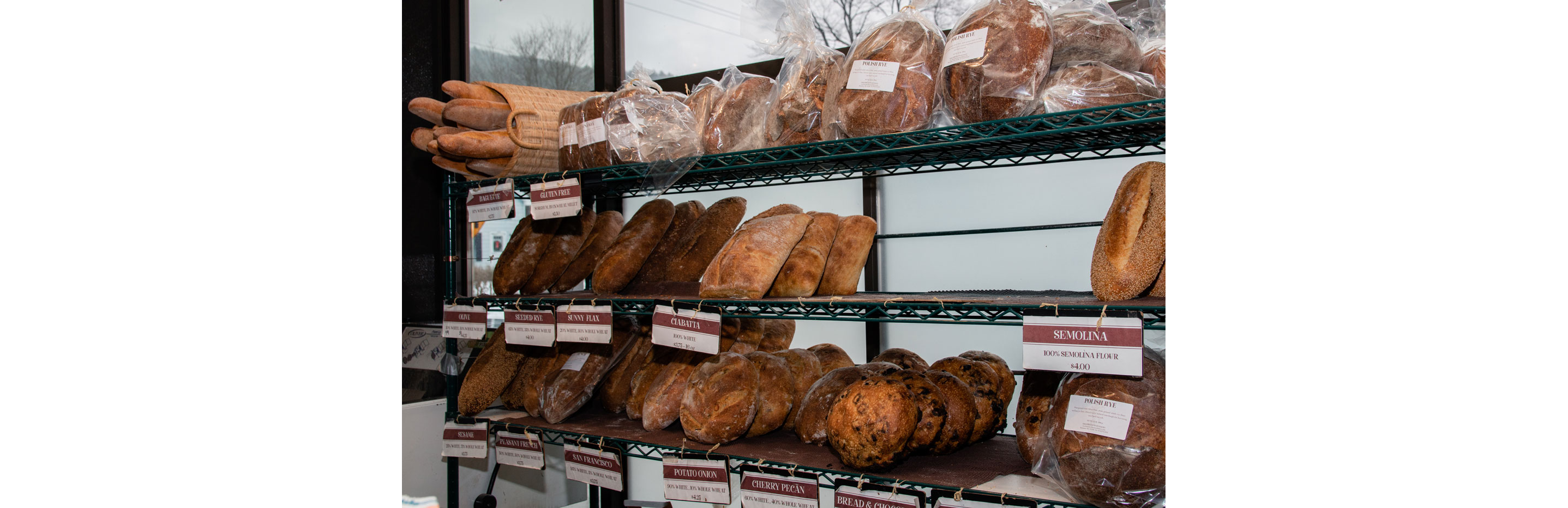 A variety of loaves of bread on display.