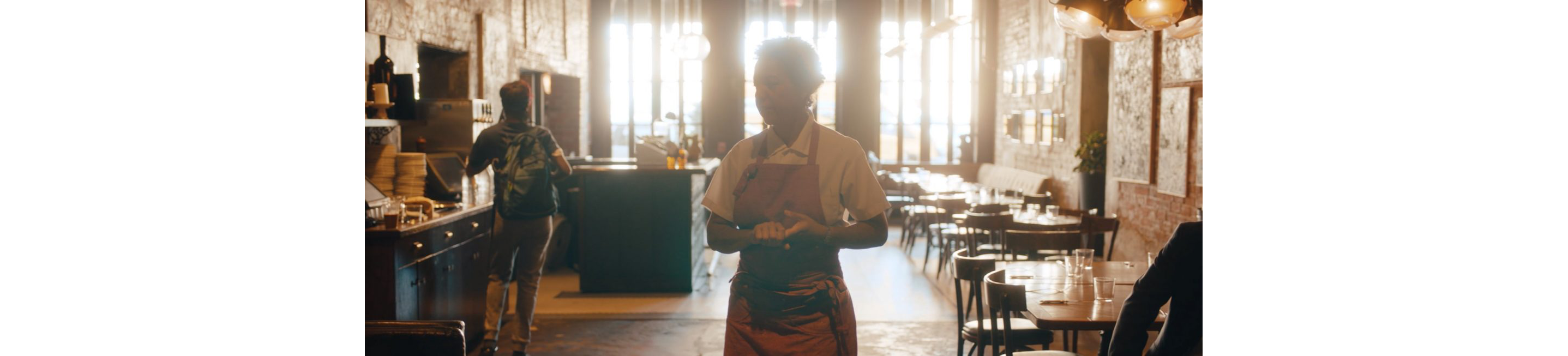 Nina Compton observing her restaurant, Bywater American Bistro.