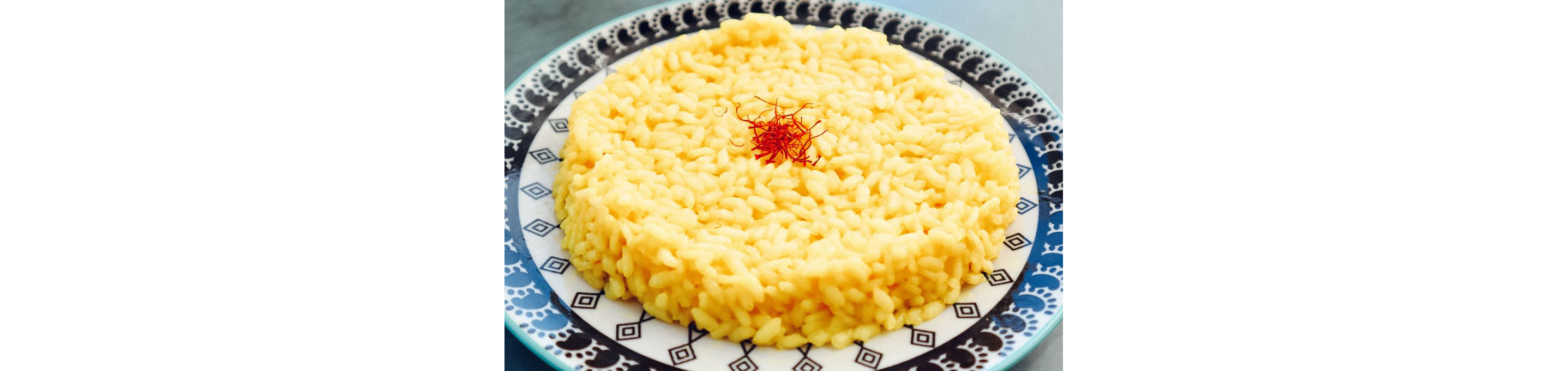 A perfect circle of basmati rice topped with saffron