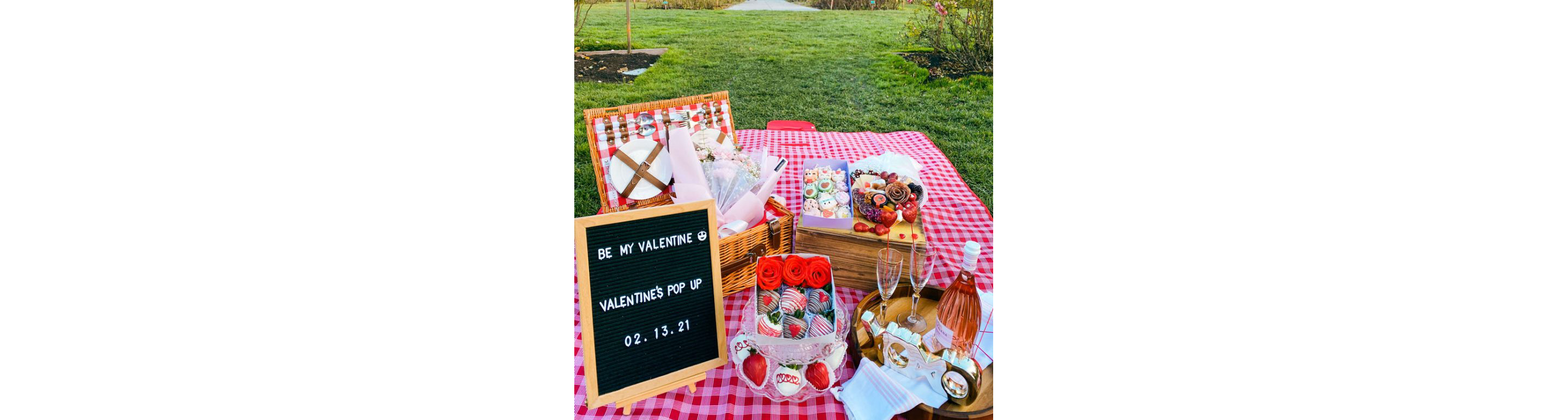 A Valentine's Day picnic set at the park.