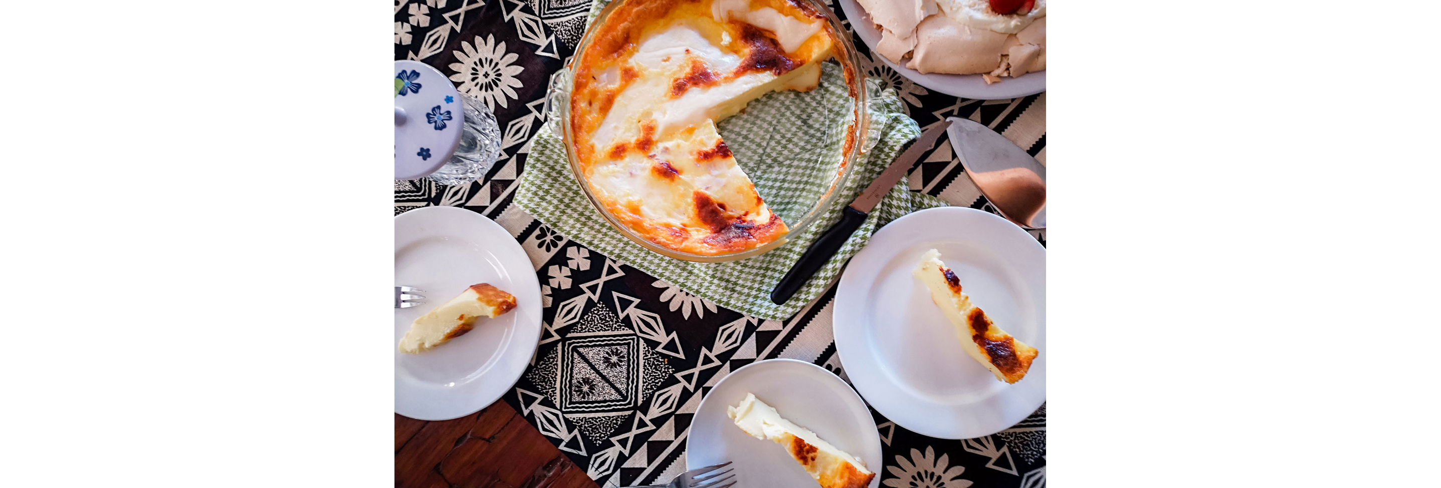 A sliced Indonesian dish resting on a table.