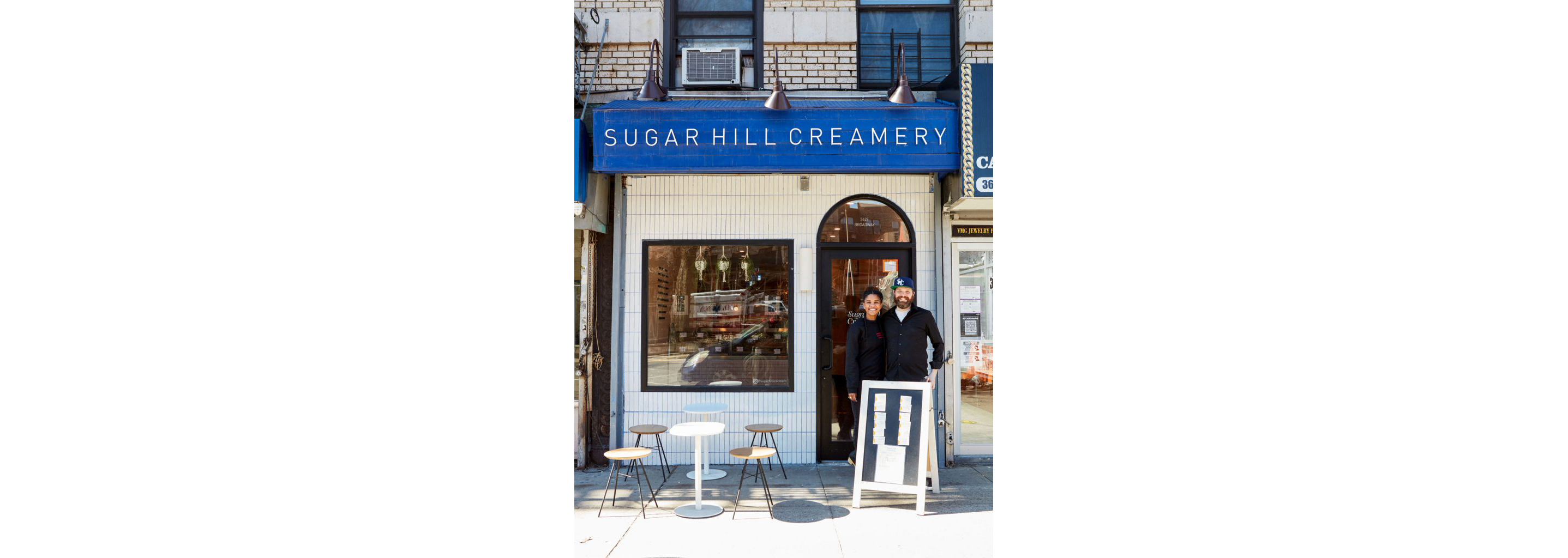 Petrushka and Nick posing for a photo in front of Sugar Hill Creamery.