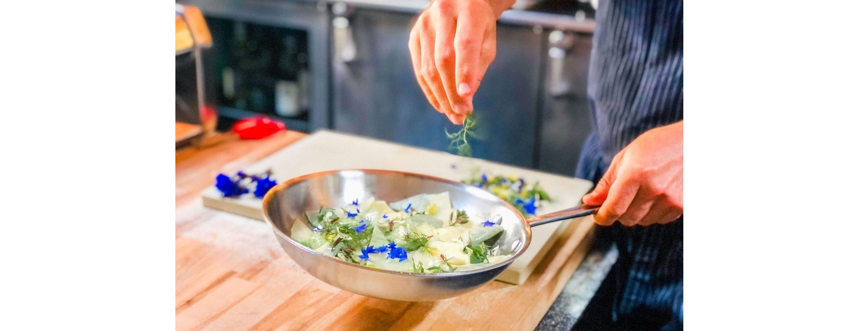 Edible flowers garnishing a dish.