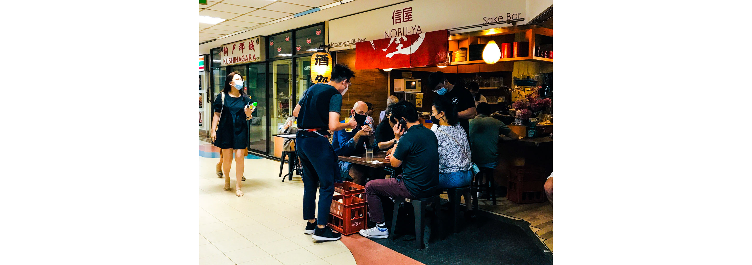 People drinking at Nobu-ya.