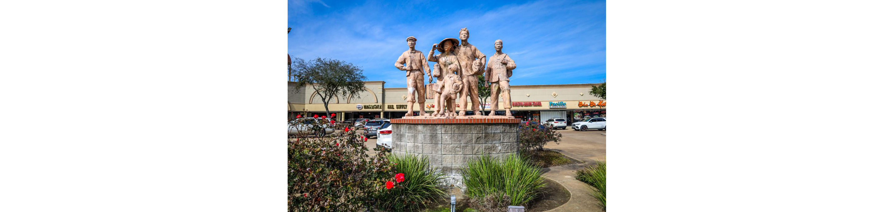 A statue of a Vietnamese refugee family.