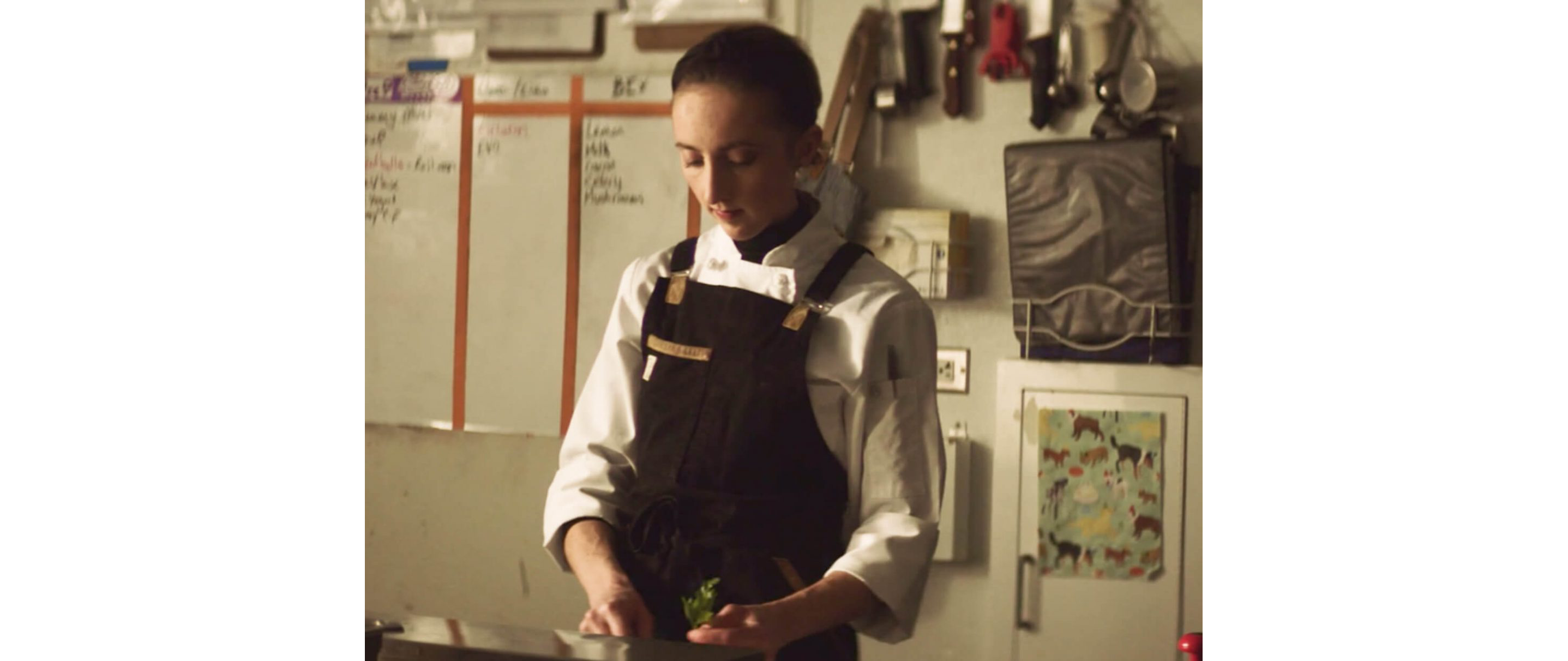 Karyn Tomlinson prepping herbs.