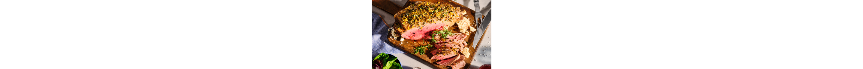 A medium rare leg of lamb.
