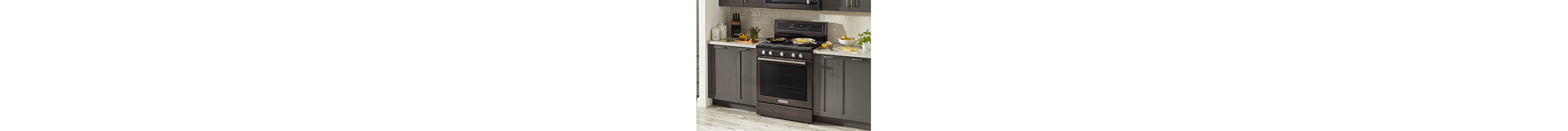 KitchenAid® oven set in gray cabinetry