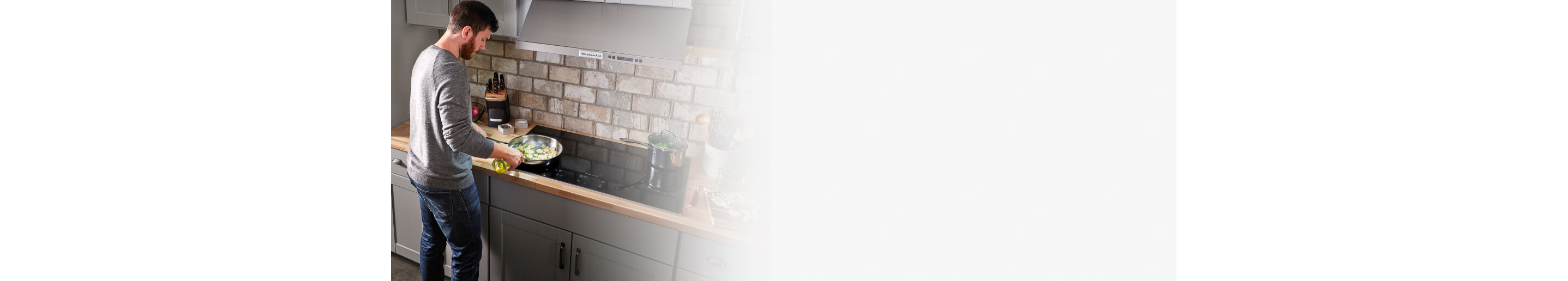 Person cooking on an electric cooktop