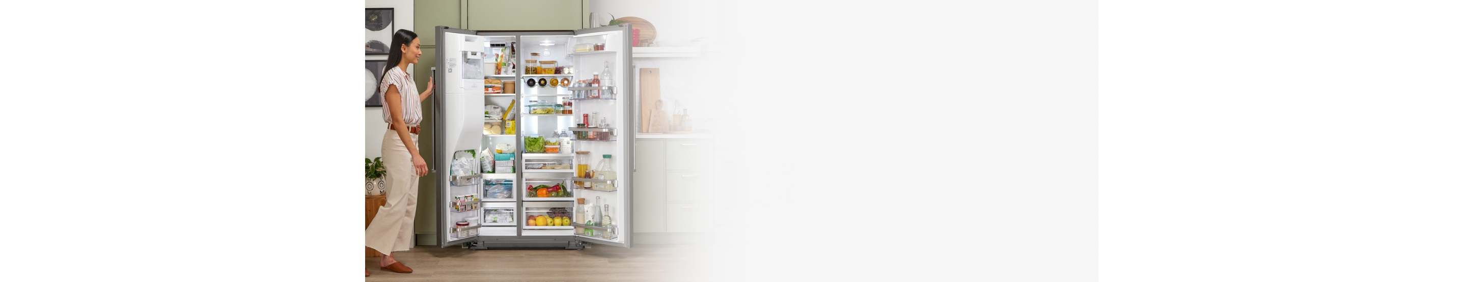 Side-by-side refrigerator filled with fresh and frozen food