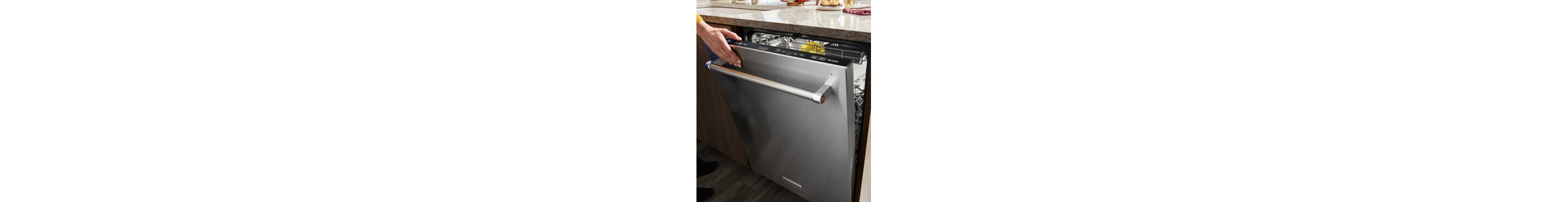 Person opening a top control dishwasher