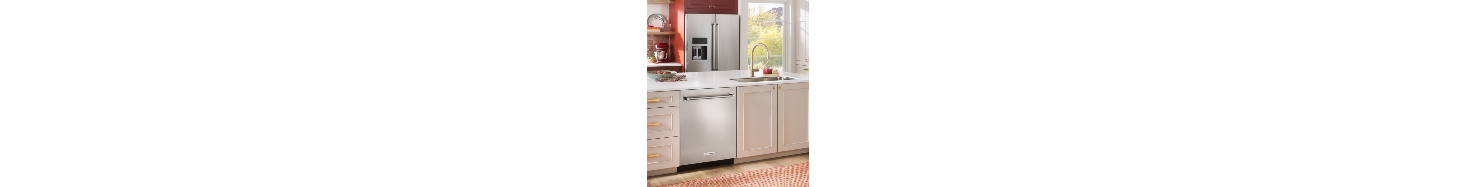 A stainless steel dishwasher and refrigerator in a kitchen