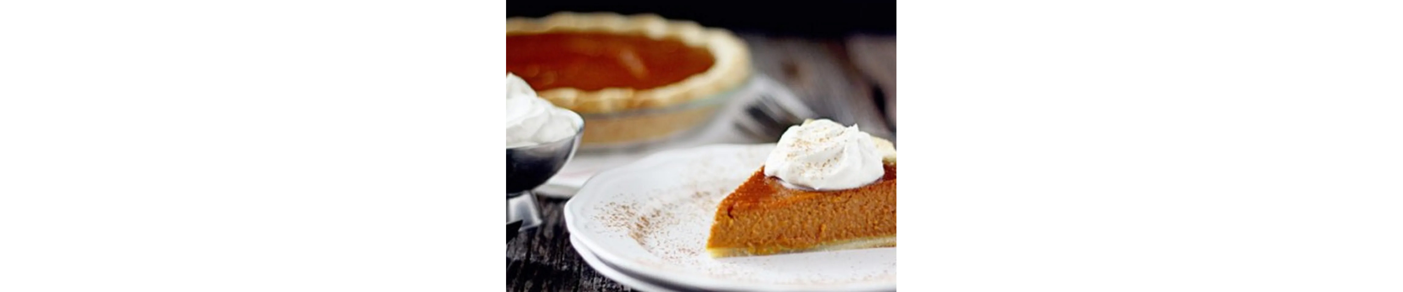 Slice of sweet potato pie on white plate