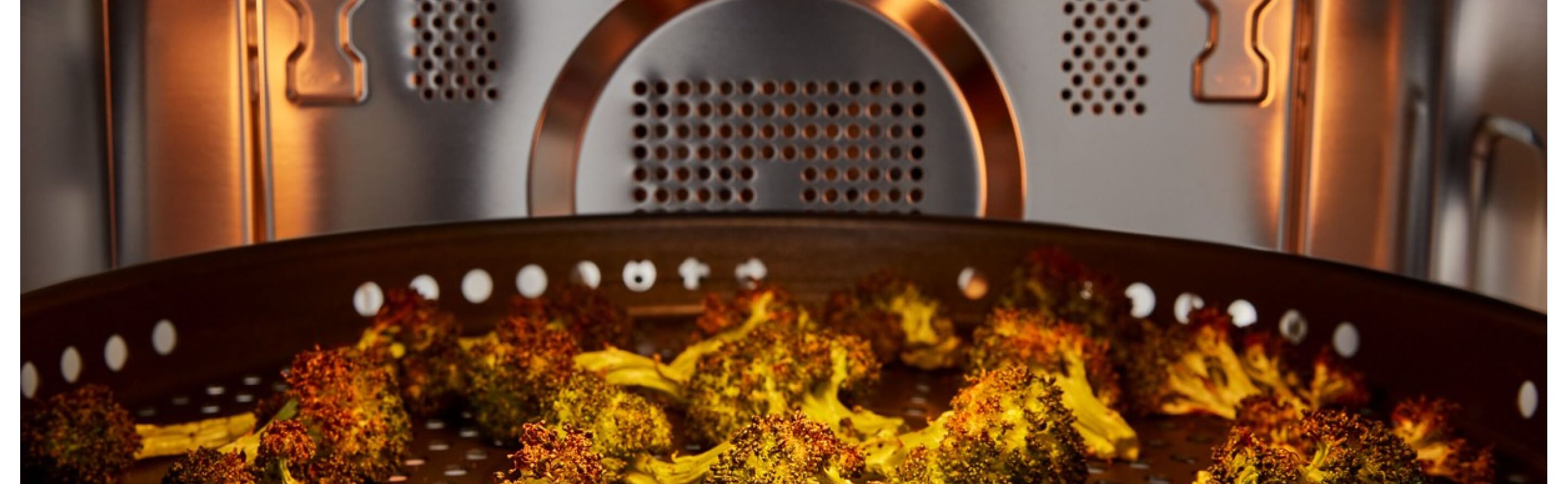 Broccoli air frying in a microwave cavity