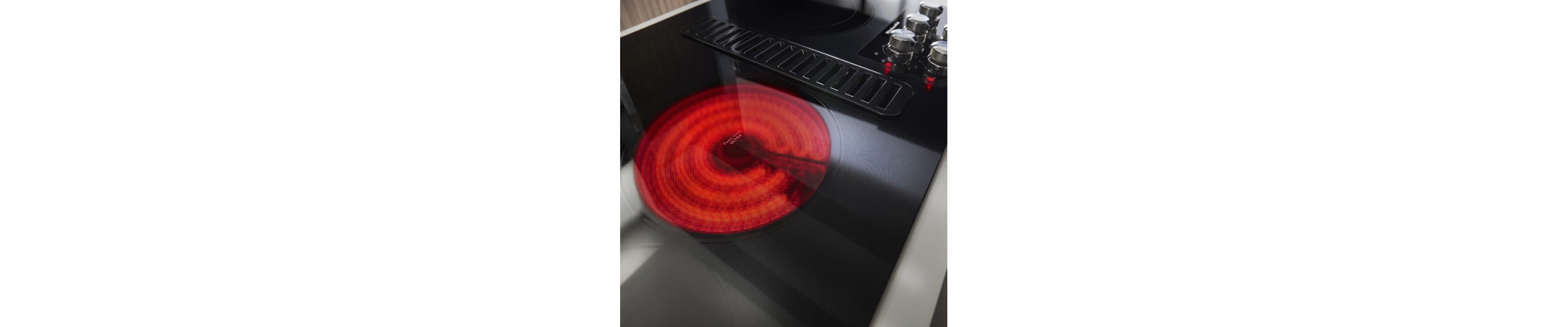 Heating element activated and glowing red on an electric cooktop